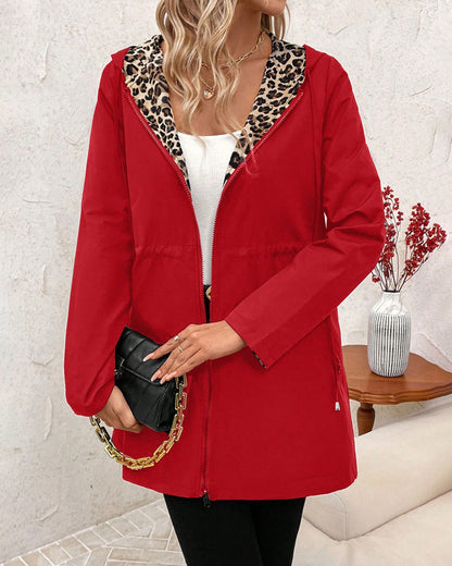 Abrigo reversible mujer con capucha y estampado animal