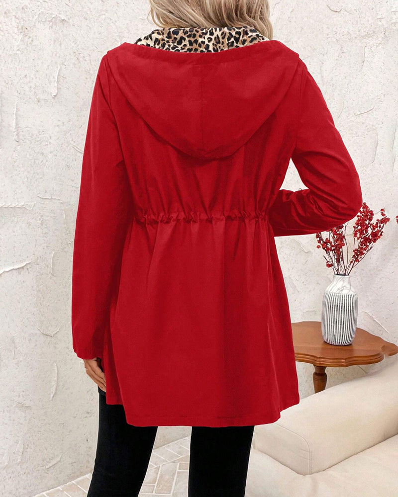 Abrigo reversible mujer con capucha y estampado animal