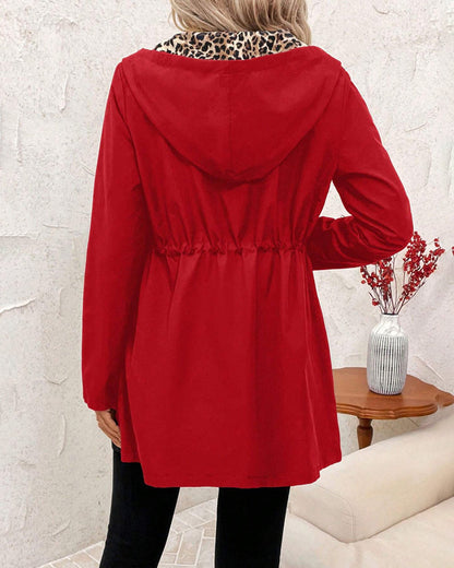 Abrigo reversible mujer con capucha y estampado animal