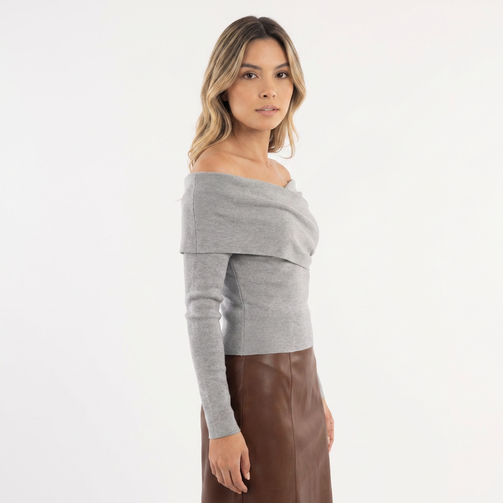 mujer de punto hombros descubiertos