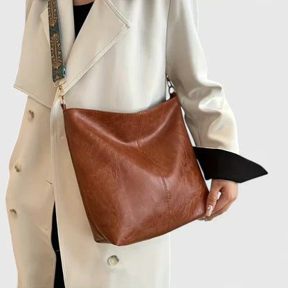 Bolso de hombro mujer con correa bandolera estampada
