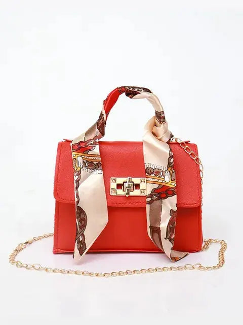 Bolso de mano mujer con cadena y pañuelo decorativo elegante