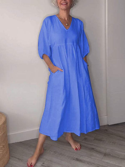 Vestido midi mujer con escote en V bolsillos y corte fluido