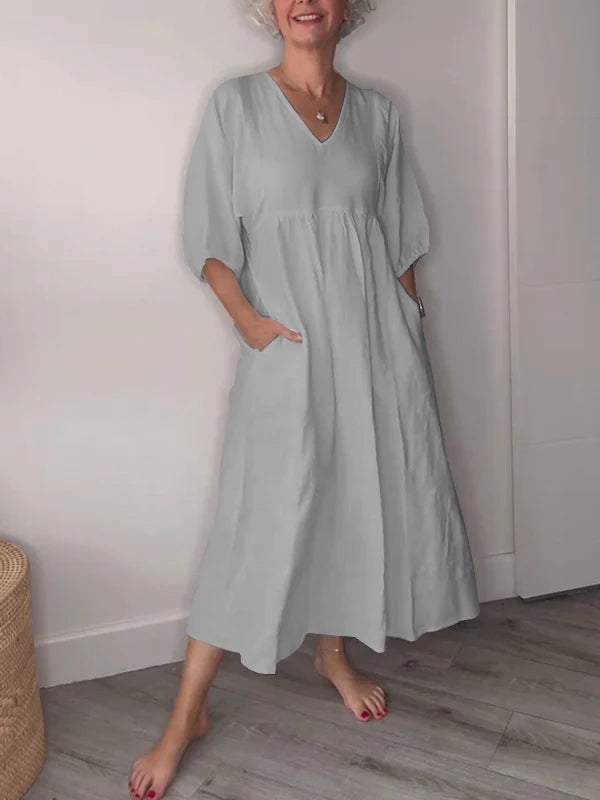 Vestido midi mujer con escote en V bolsillos y corte fluido