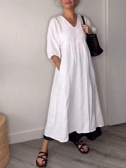 Vestido midi mujer con escote en V bolsillos y corte fluido