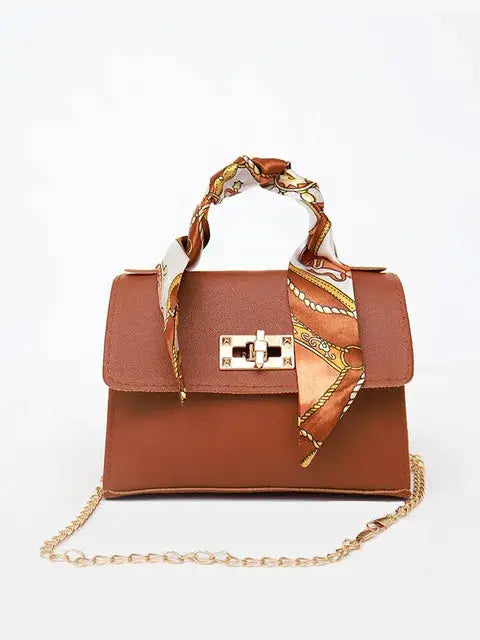 Bolso de mano mujer con cadena y pañuelo decorativo elegante