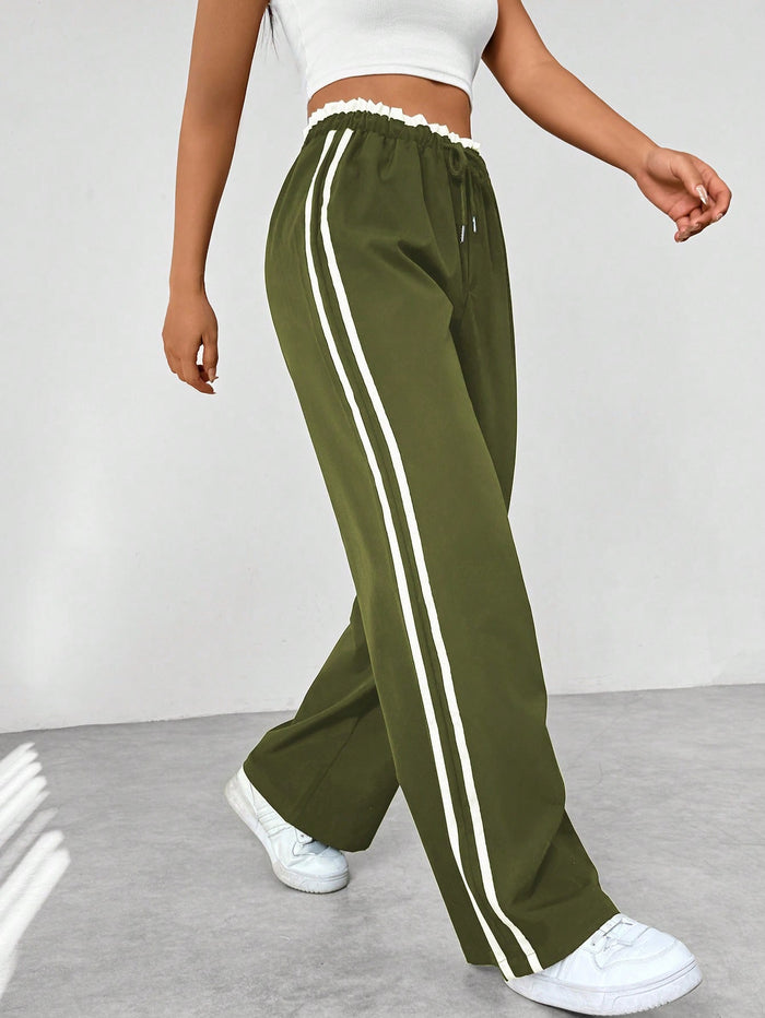Pantalón deportivo mujer con cintura alta y corte suelto