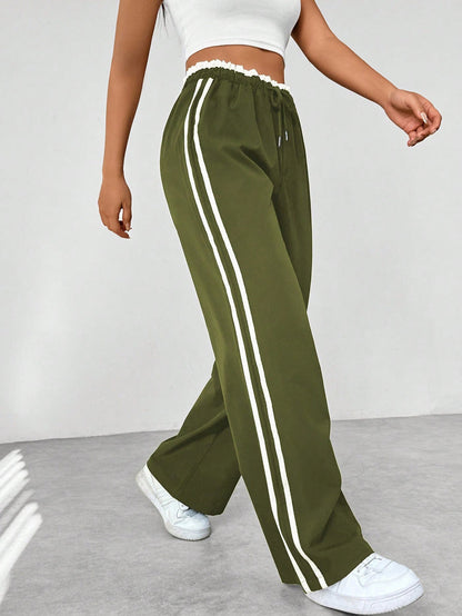 Pantalón deportivo mujer con cintura alta y corte suelto