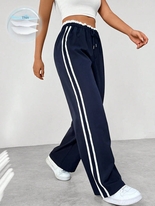 Pantalón deportivo mujer con cintura alta y corte suelto - Mavetta