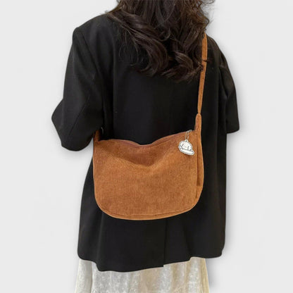 Bolso de hombro mujer con forma elegante acabado pulido