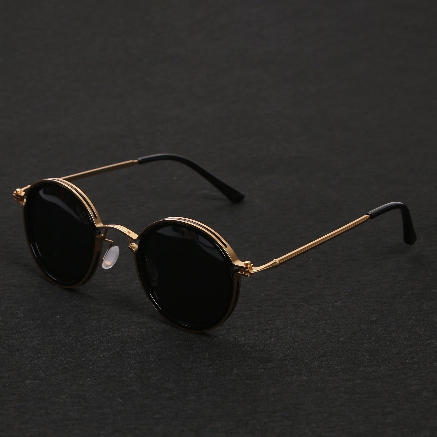 Gafas de sol unisex montura redonda polarizadas varillas metálicas