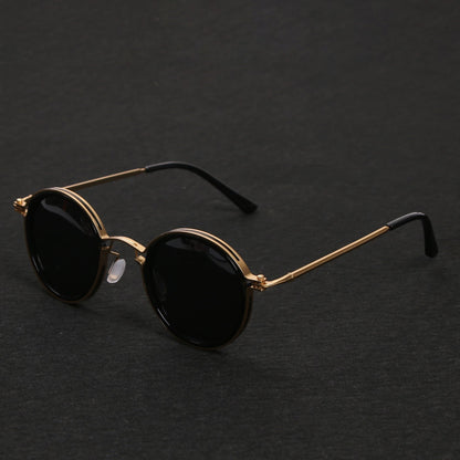 Gafas de sol unisex montura redonda polarizadas varillas metálicas