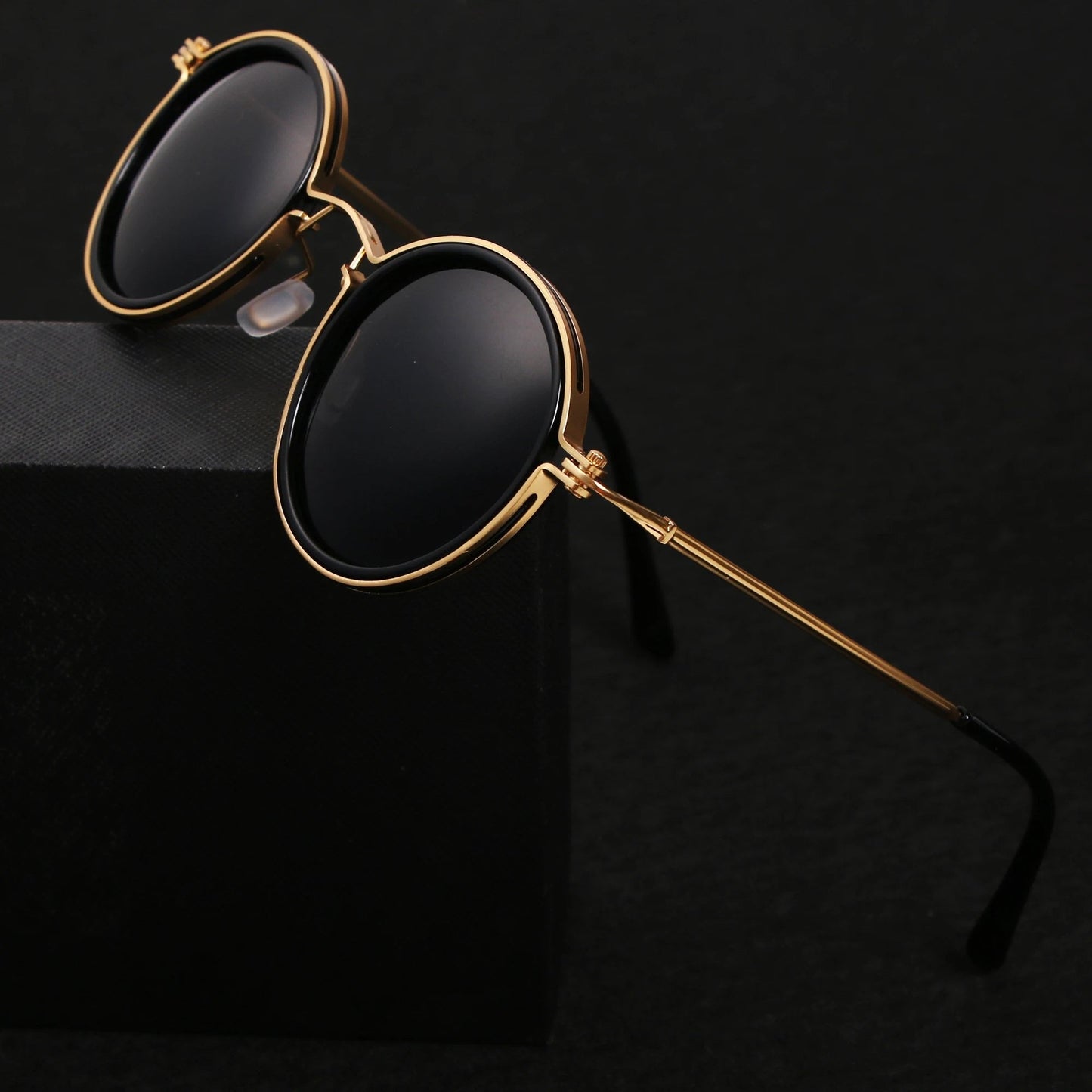 Gafas de sol unisex montura redonda polarizadas varillas metálicas