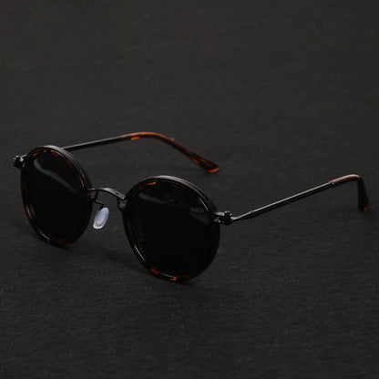 Gafas de sol unisex montura redonda polarizadas varillas metálicas