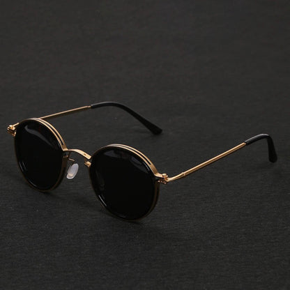 Gafas de sol unisex montura redonda polarizadas varillas metálicas