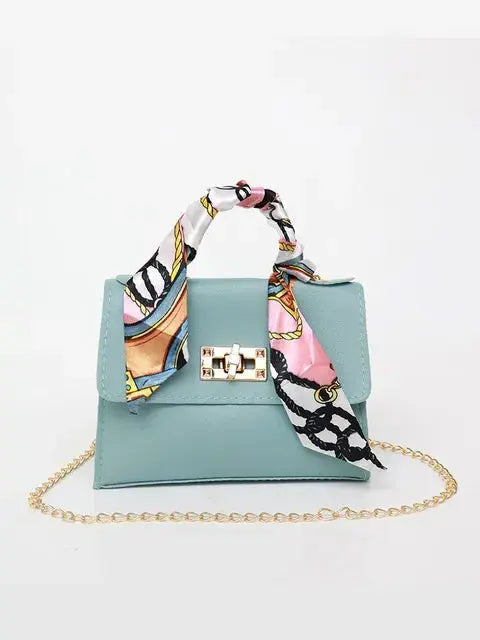 Bolso de mano mujer con cadena y pañuelo decorativo elegante