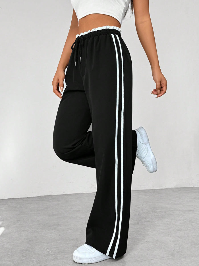 Pantalón deportivo mujer con cintura alta y corte suelto